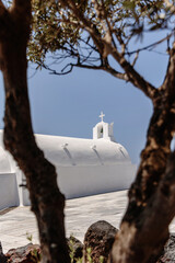 Cycladic White Church Framed by Olive Trees on Santorini, Greece
