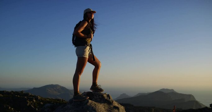 Woman, hiker and travel for adventure, mountain top and peak, outdoor and backpack. Hiking, fitness and climber for training, workout and climibing nature to explore, hobby and summit for freedom