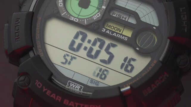 LCD display of a tough sports watch with running timer and stopwatch 
