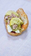 Fricasse with Tuna, Pickled Lemon, Hard-Boiled Egg, Harissa, Olives, and Pickles – פריקסה Tunisian Treat