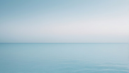 Obraz premium blue background seascape ocean sunrise clouds room for copy peaceful