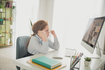 Photo of charming adorable preteen age girl learner wearing uniform study from home flat daylight indoors