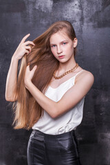 Naklejka premium Fashion portrait of a young beautiful blonde girl