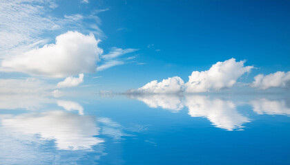 Fototapeta premium Blue Sky and Clouds Reflecting in Water and Copy Space