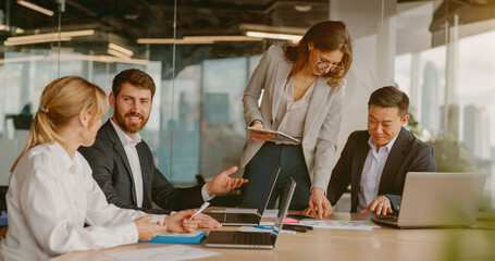 An engaging and dynamic team meeting takes place, emphasizing collaboration and innovation in a...