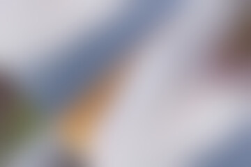 Gradient background of blue, white grey, and brown. Abstract background with concept of pastel gradient, mix colors, modern, and classic for wallpaper. Blue, gray, and brown-orange gradient background