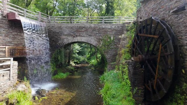 Different types of watermills moved by the river in the old village of Taramundi, Asturias.