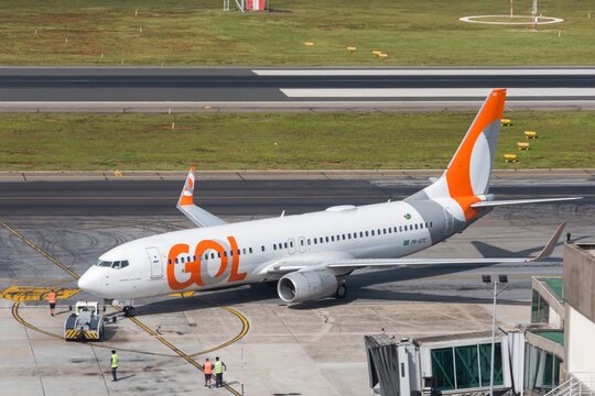 Gol Airlines Boeing 737 Max 8, Congonhas Airport. City of S&atilde;o Paulo, Brazil. Airplane maneuvering near the boarding bridge.