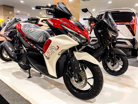 Yogyakarta, Indonesia - July 1, 2024: The latest automatic scooters or matic motorcycles from Yamaha, Aerox and NMAX, at an automotive exhibition in a shopping mall.