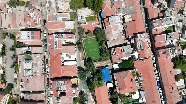 Green soccer field in the heart of Jerusalem Mahane Yehuda area, Top down view