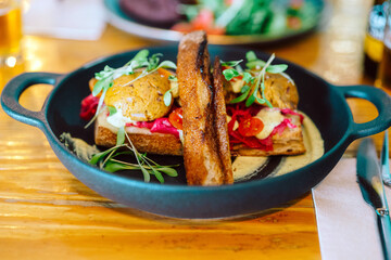 Elegant Black Plate with Healthy Vegetarian Brunch