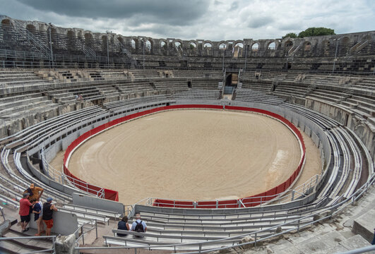 Arles Roman Amphitheatre, built in 90 AD and held 20,000 spectatators for chariot races and handto habd battles. Still in use today for concerts.