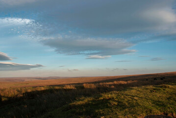 Exmoor Landscape. A view across Exmoor shortly before dusk. Beautiful cloudy blue sky.