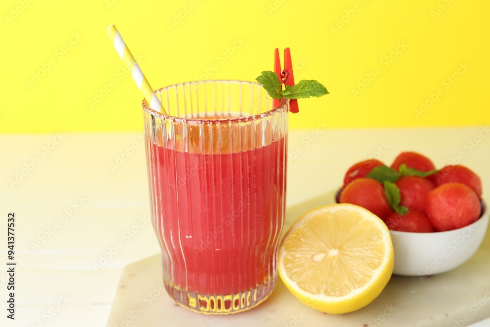 Canvas Prints Tasty watermelon drink in glass and fresh fruits on white table, closeup