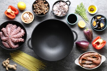 Ingredients for wok on grey table, flat lay