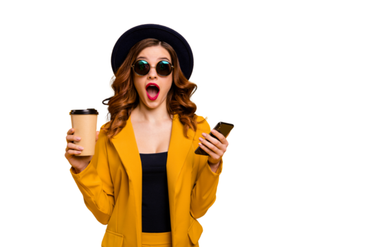 Close up photo beautiful funky she her lady open mouth amazed hands arms telephone vacation traveler hot beverage paper container reader wear specs formal-wear suit isolated yellow bright background