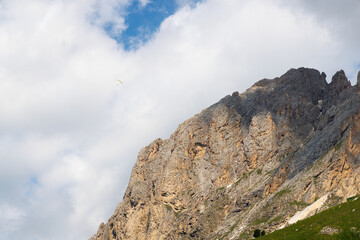 Fototapeta premium Paragliding over the Sassolungo - Val di Fassa - Italy