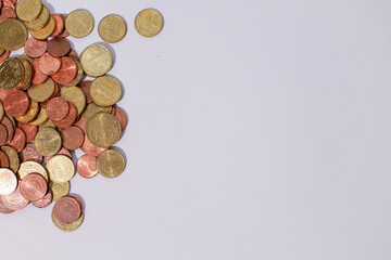 banknotes and coins on white background