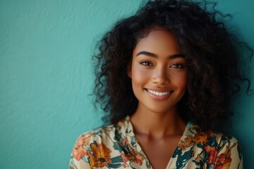 Obraz premium a young woman with natural curly hair, smiling confidently against various pastel backgrounds. These images are ideal for content focused on beauty, diversity, and modern fashion.