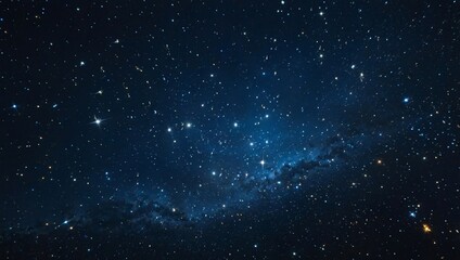A clear, deep blue space is filled with sparkling stars, creating a mesmerizing night sky scene