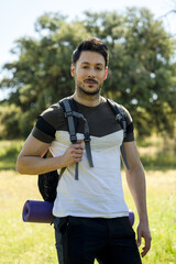 Fototapeta premium backpacker facing the camera in nature