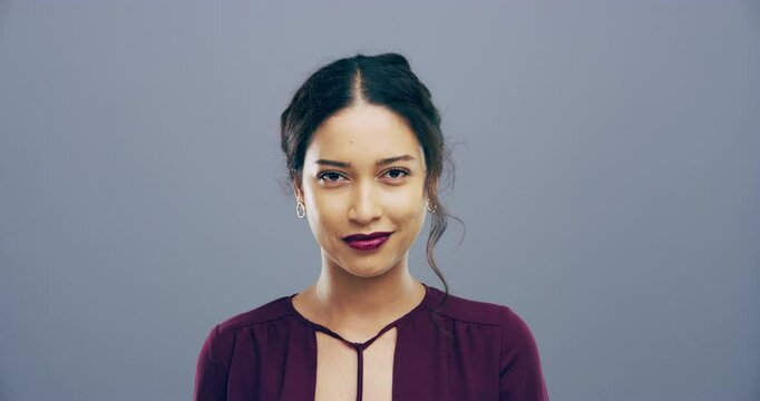 Face, smile and happy woman or student in studio on a grey background mockup space. Portrait, makeup and facial expression of girl, model and funny person laughing at joke in Brazil on a backdrop