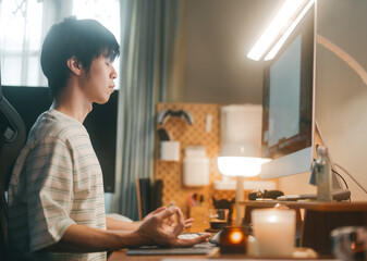 Man sitting meditation posture at home chakra connection to higher self and spiritual