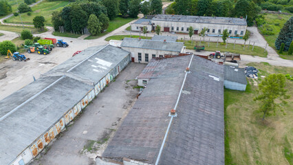 Drone photography of an old indoor chicken factory during summer day