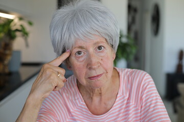 Very angry senior woman expressing her disappointment 