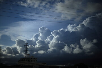 Cumulonimbus (from Latin cumulus 'swell' and nimbus 'cloud') is a dense, towering, vertical cloud,...