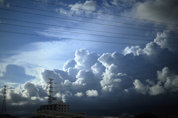 Cumulonimbus (from Latin cumulus 'swell' and nimbus 'cloud') is a dense, towering, vertical cloud,...