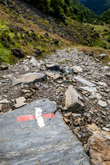 GR - Sentier de grande randonnée - Rocky path with painted trail mark