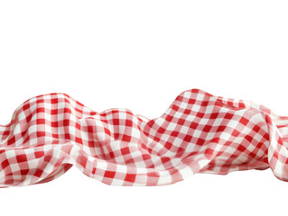 Fototapeta premium Red and white checkered fabric draped on white background, soft and flowing.