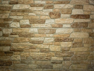 Light brown stone masonry background. Art decor background. Backgrounds and textures