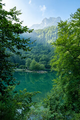 Lac de Bethmale - Pyrénées - Ariège - Verdant Hills and Forest Reflected in Tranquil Lake