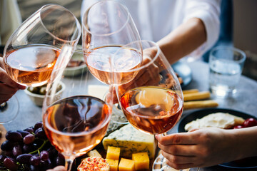 Glasses of rose wine seen during a friendly party of a celebration.