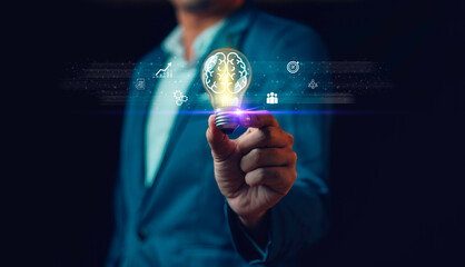 Hand of man holding illuminated light bulb, Idea innovation and inspiration concept. new ideas Great inspiration and innovation new beginning