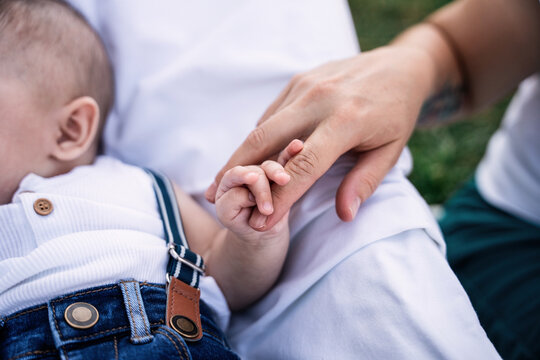 Tender moment between lesbian couple and their son