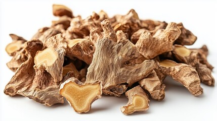Pile of dried ginger roots isolated on a white background 
