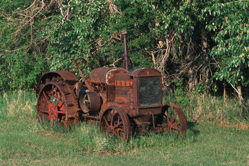 Old Rusted Tractor In Field