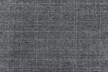 Texture of black or gray fabric for sewing clothes. Textile. Striped material