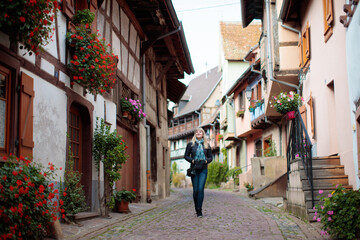Young woman in historical city center in France