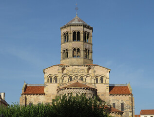 Romanesque Abbey of Saint-Austremoine. Issoire. Auvergne. France. 12th century. General view of the apses and the bell tower. 