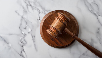 Wooden gavel on marble surface. Judge's hammer. Law and justice concept, constitution, courtroom