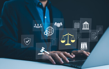 Legal Professional with Justice Icons. Legal professional using laptop with virtual icons...