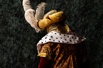one of the Three wise men in traditional richly detailed costumes