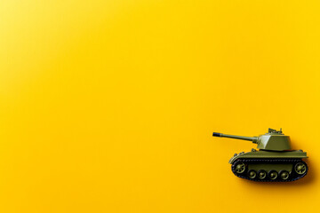 Toy Tank on Bright Yellow Background