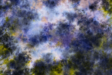 tie dye pattern hand dyed on cotton fabric abstract texture background.