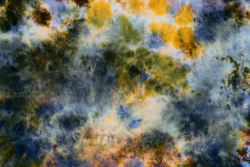 tie dye pattern hand dyed on cotton fabric abstract texture background.