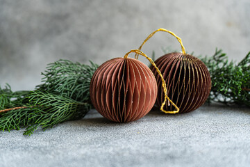 Elegant Christmas ornaments on textured backdrop